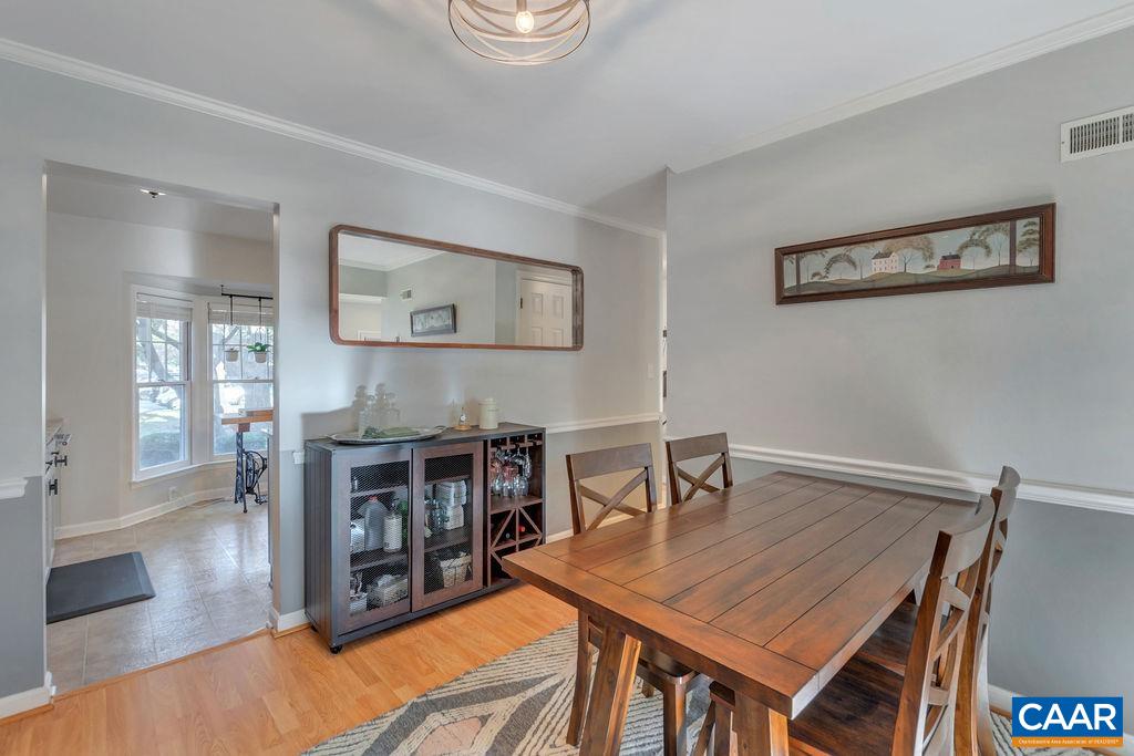 1436 Minor Ridge Court Charlottesville, VA 22901 - Photo 14 of 59 a dining room with furniture and wooden floor