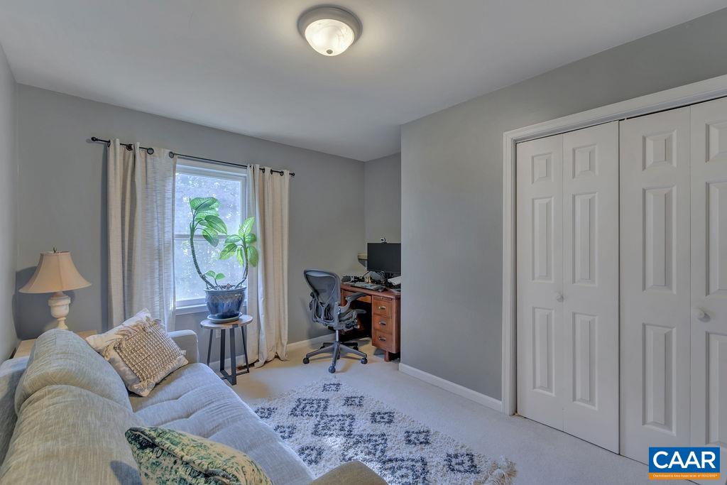 1436 Minor Ridge Court Charlottesville, VA 22901 - Photo 30 of 59 a living room with furniture and a window