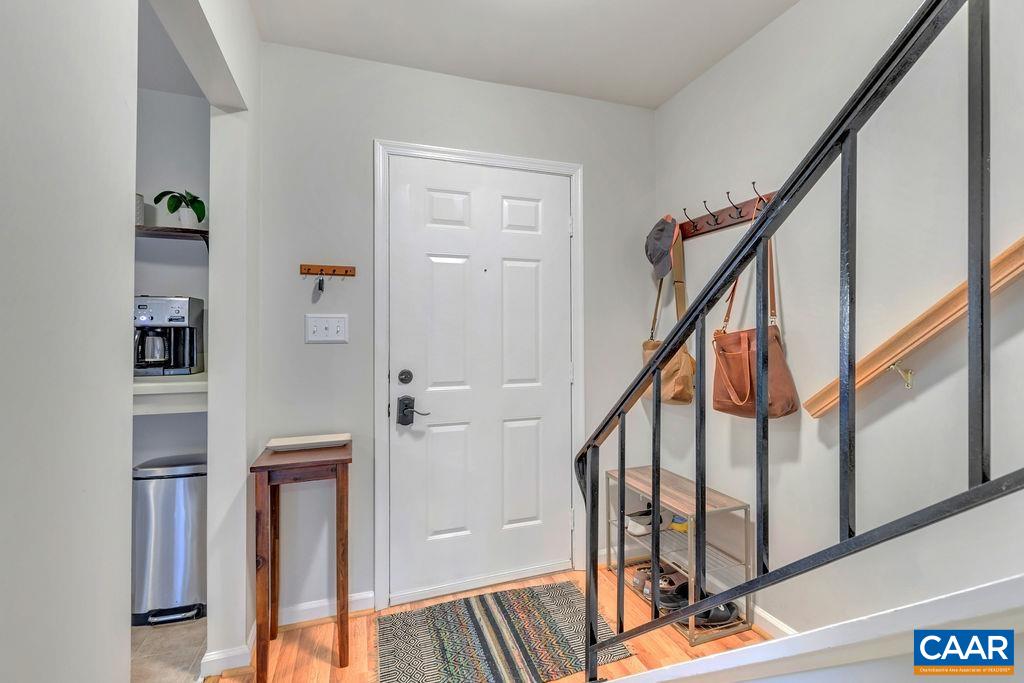 1436 Minor Ridge Court Charlottesville, VA 22901 - Photo 5 of 59 a view of an entryway with wooden floor and stairs