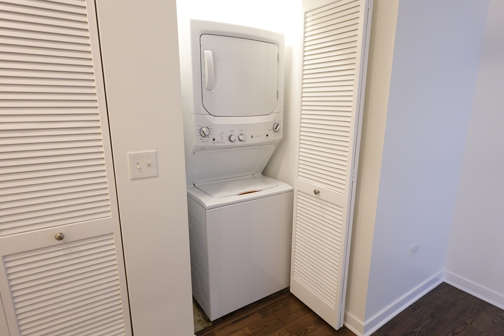 3963 West Belmont Avenue, Unit 219 Chicago, IL 60618 - Photo 17 of 28 a utility room with dryer and washer