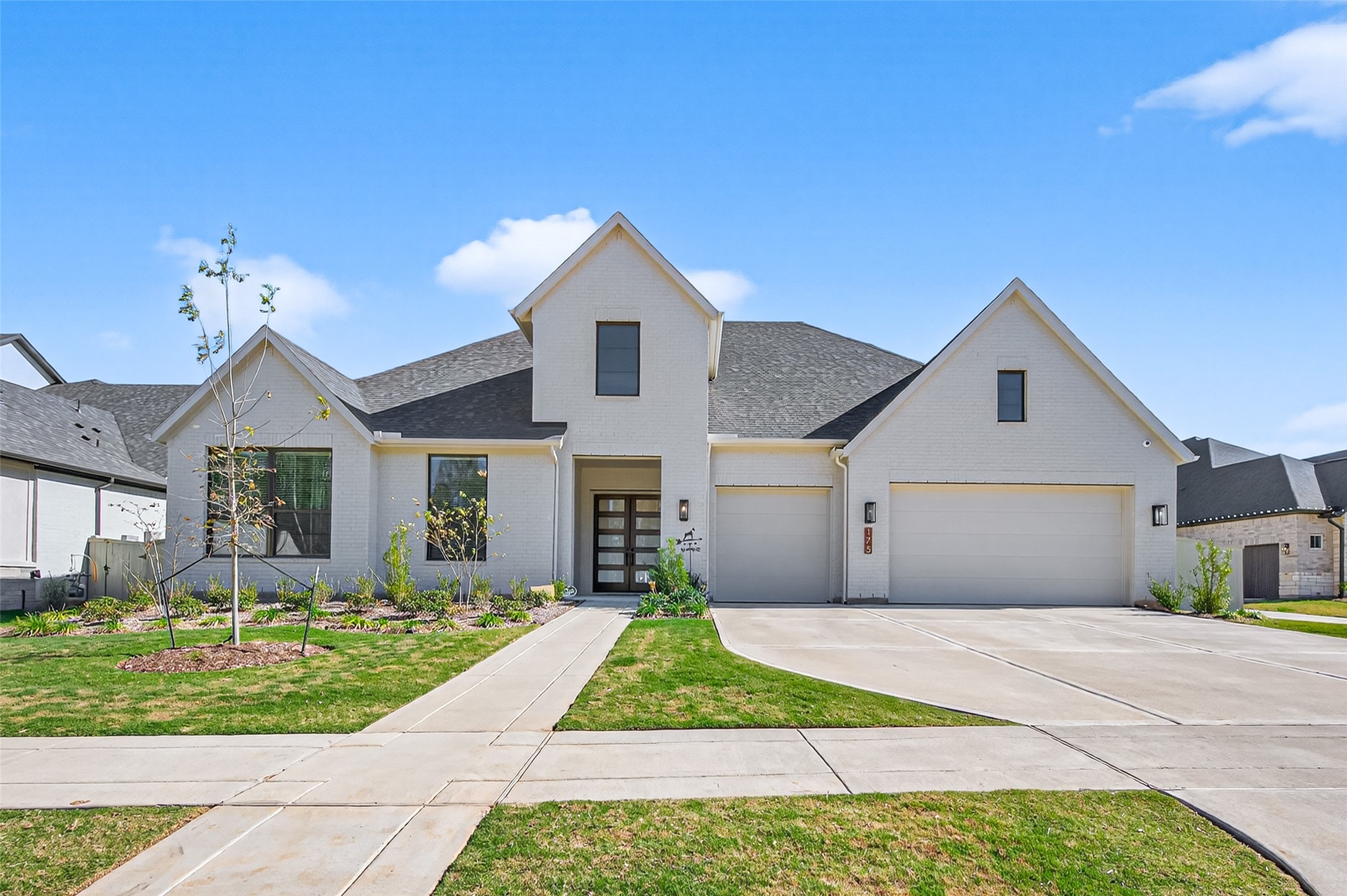 175 Shoveler Duck Way Magnolia, TX 77354 - Photo 1 of 48 a front view of a house with garden