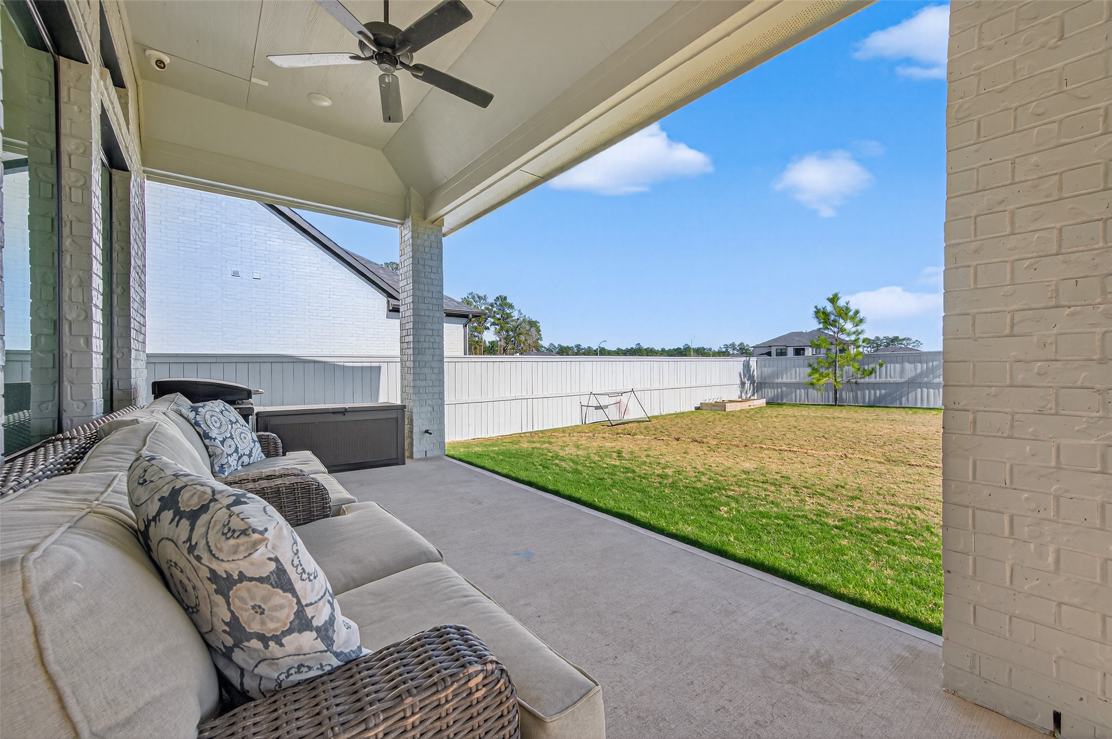 175 Shoveler Duck Way Magnolia, TX 77354 - Photo 44 of 48 a bed sitting in a bedroom next to a window with outer view