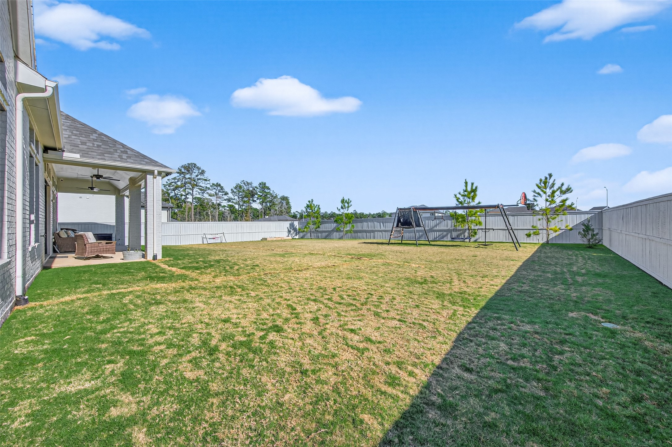 175 Shoveler Duck Way Magnolia, TX 77354 - Photo 47 of 48 a view of a fountain in front of a house with a big yard