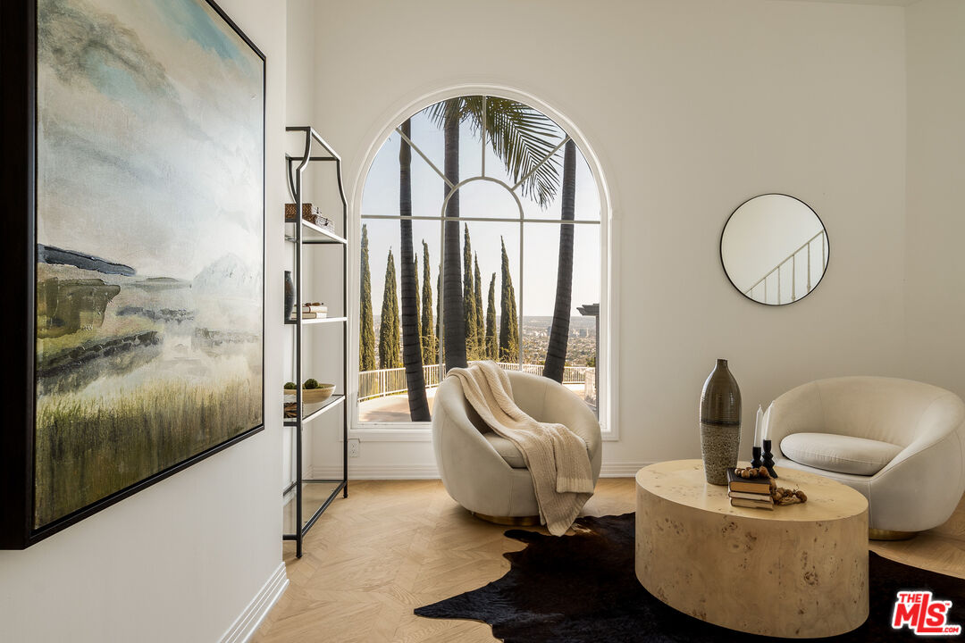 8527 Hedges Way Los Angeles, CA 90069 - Photo 17 of 25 a living room with furniture and a large window