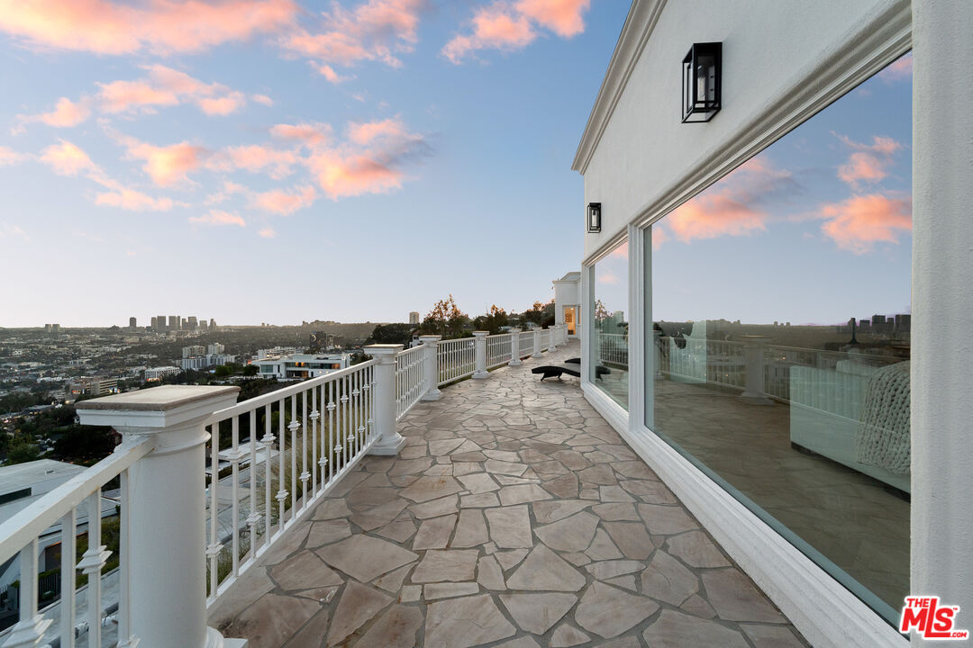 8527 Hedges Way Los Angeles, CA 90069 - Photo 24 of 25 a view of a balcony with city view
