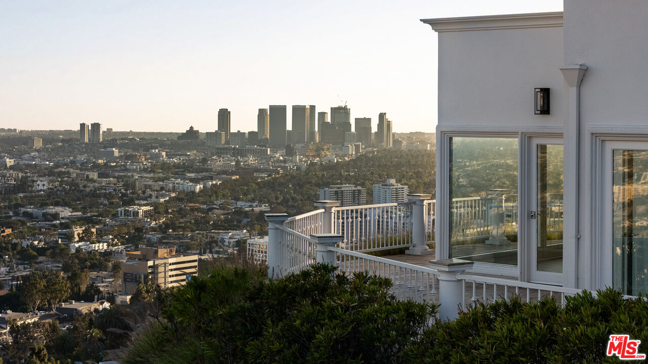 8527 Hedges Way Los Angeles, CA 90069 - Photo 3 of 25 a view of a city with tall buildings