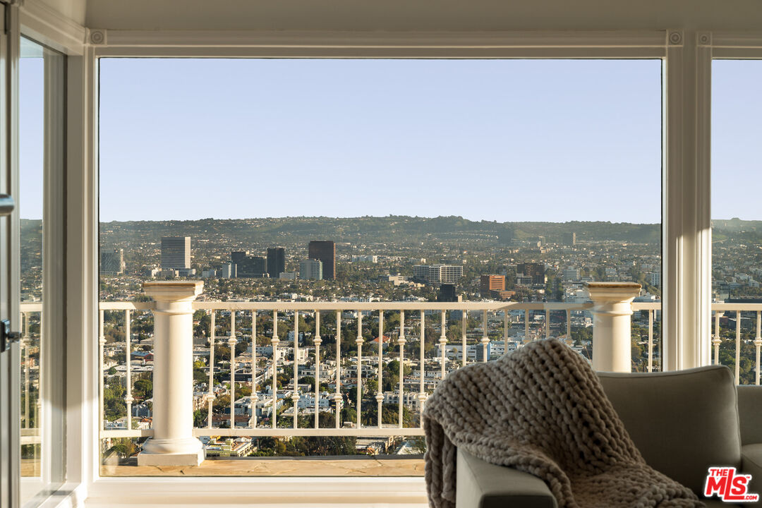 8527 Hedges Way Los Angeles, CA 90069 - Photo 5 of 25 a view of a city from a balcony