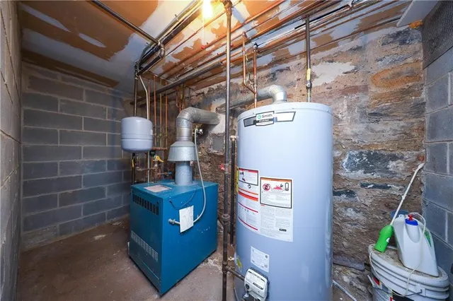 a bathroom with a shower sink and mirror