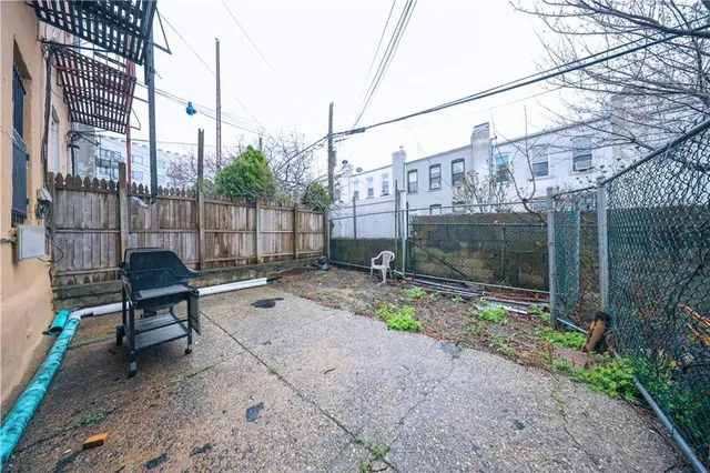a garden view with a sitting space