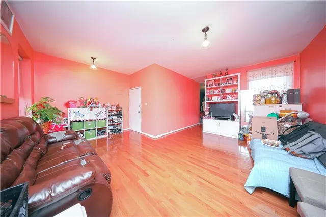 a room with furniture and a wooden floor