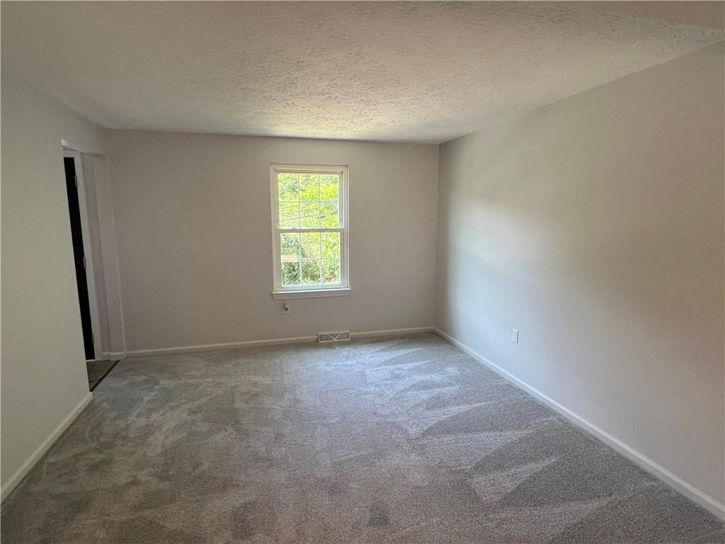 8822 Sloop Road Pittsburgh, PA 15237 - Photo 13 of 27 an empty room with a window