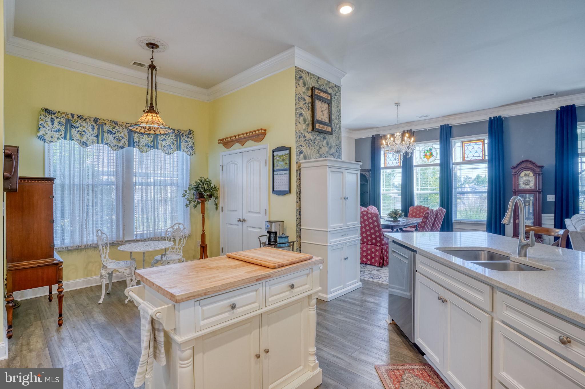 15272 Crape Myrtle Road Milton, DE 19968 - Photo 45 of 61 Charming kitchen with sunny ambiance.