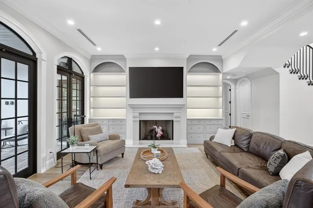 a stove top oven sitting inside of a kitchen
