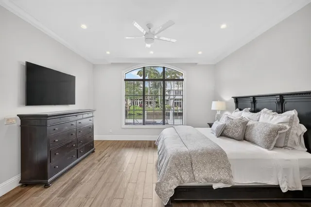 a bathroom with a tub shower and sink