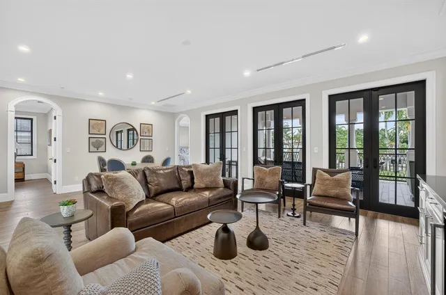 front view of a brick house with a yard