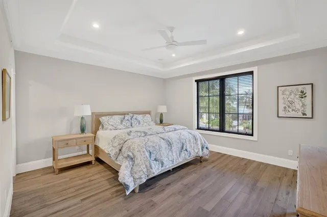 a view of a lake with a house in the background