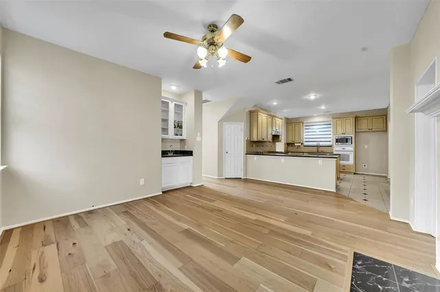 a view of kitchen with wooden floor