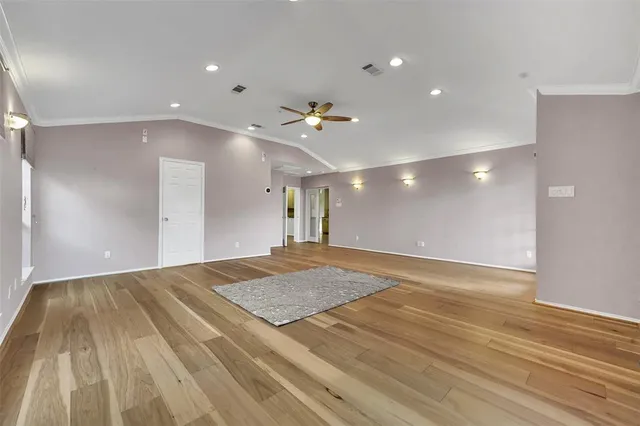 a view of a hallway with a room