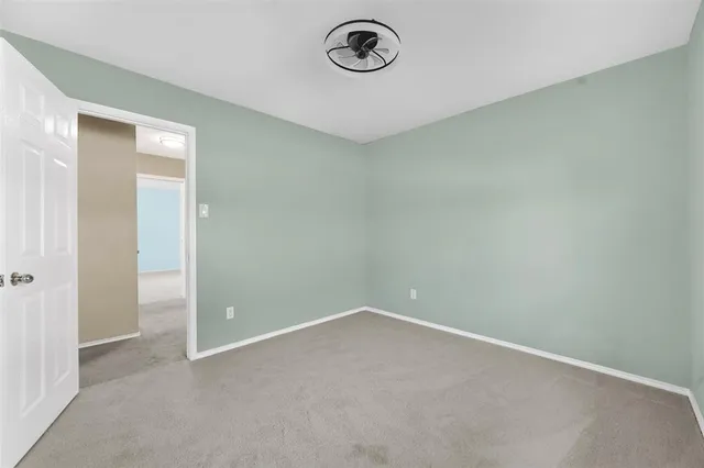 an empty room with a workbench