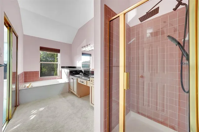 a kitchen with a refrigerator and a stove