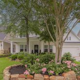 front view of a house with a garden