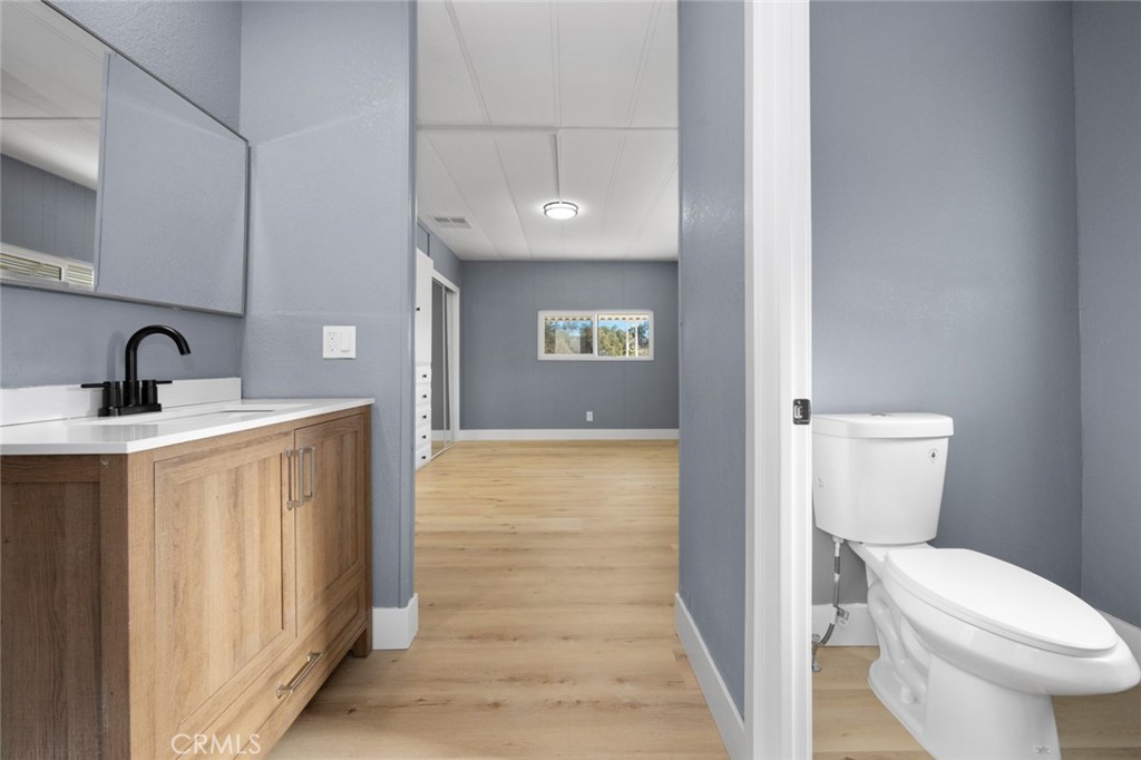 17221 Hidalgo Drive Perris, CA 92570 - Photo 19 of 32 a bathroom with a sink toilet and shower