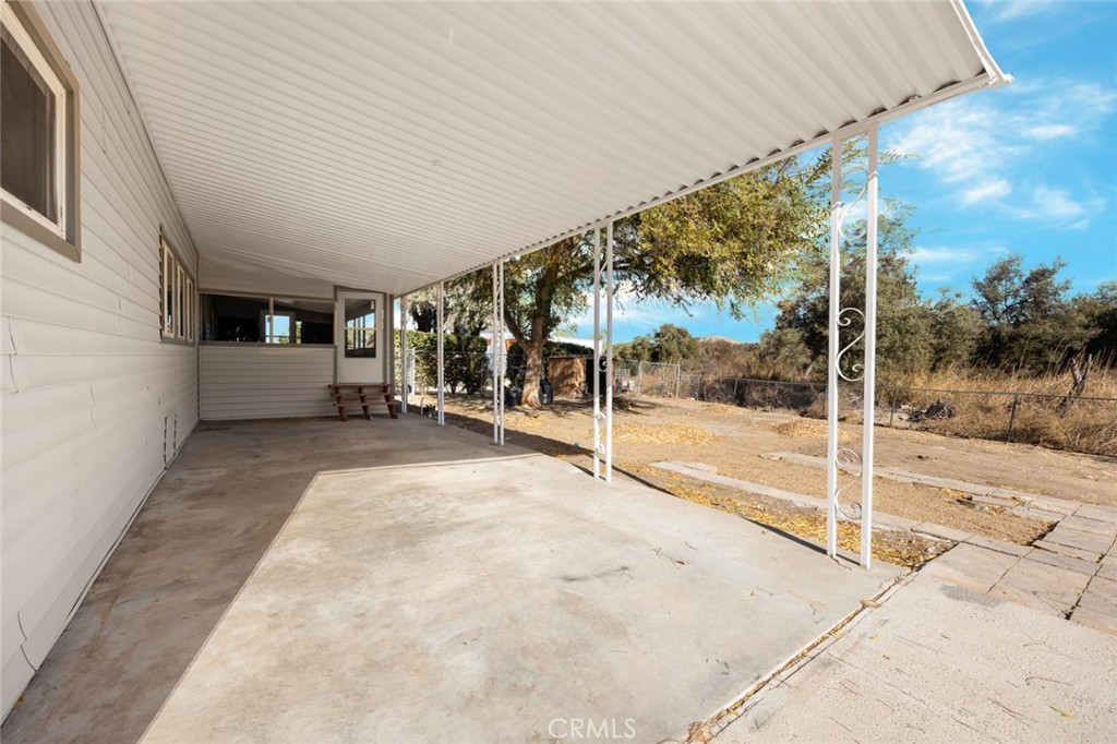 17221 Hidalgo Drive Perris, CA 92570 - Photo 27 of 32 a view of a patio with table and chairs