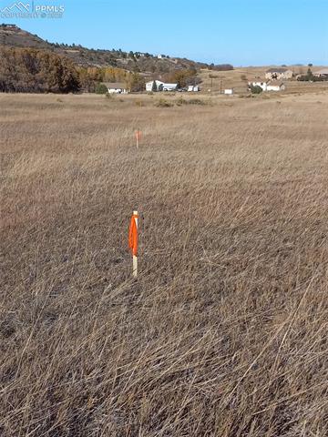 3180 Palumar Road Pueblo, CO 81004 - Photo 2 of 3 Bird's eye view featuring a mountain view and a rural view
