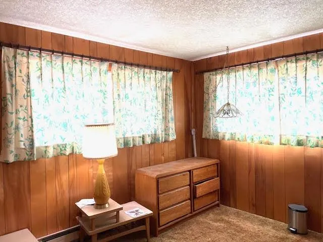 a room with furniture and a window