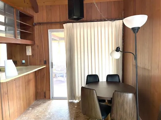 a view of a livingroom with furniture and window