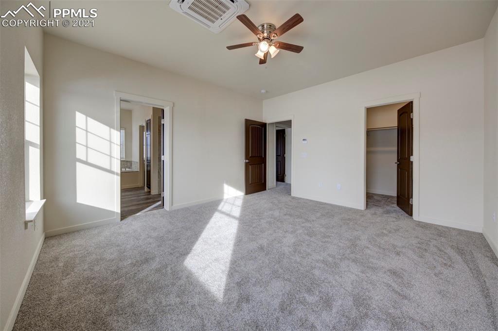 1075 Yoder Road Yoder, CO 80864 - Photo 7 of 14 a view of a big room with closet and windows
