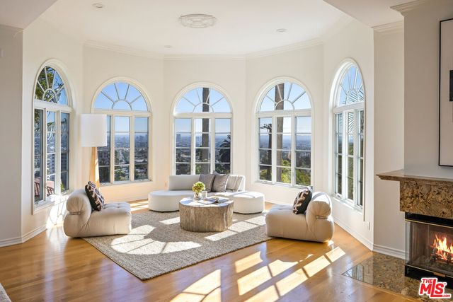 a spacious bathroom with sink shower and mirror