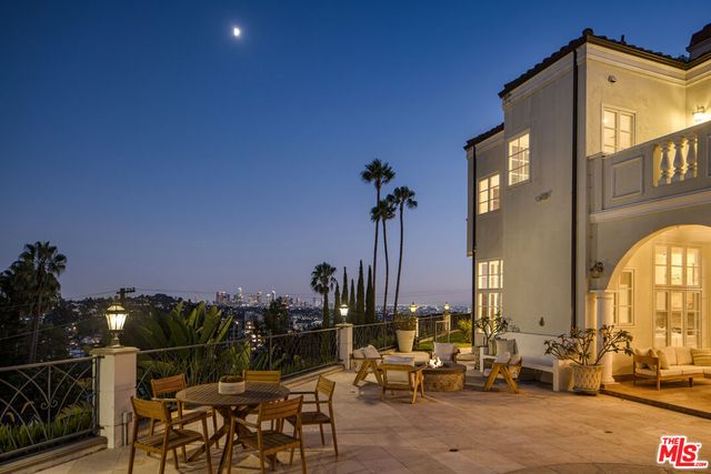 a view of swimming pool from a balcony