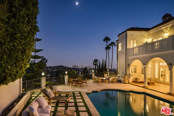 a view of swimming pool from a balcony