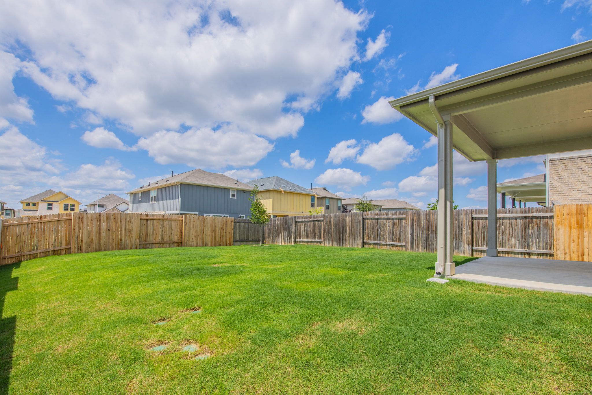593 Backstays Loop Kyle, TX 78640 - Photo 22 of 26 a view of a backyard of the house