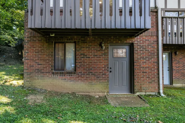 a view of a house with a street