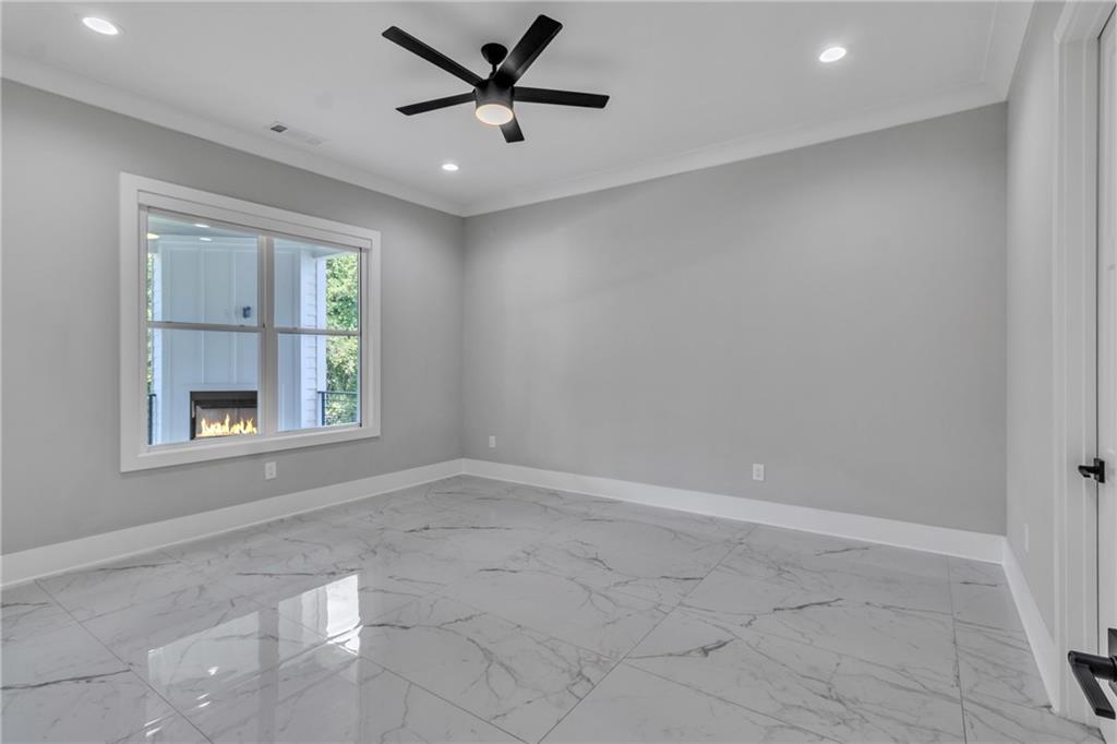 3671 Hamilton Mill Road Buford, GA 30519 - Photo 37 of 111 a view of an empty room with a window
