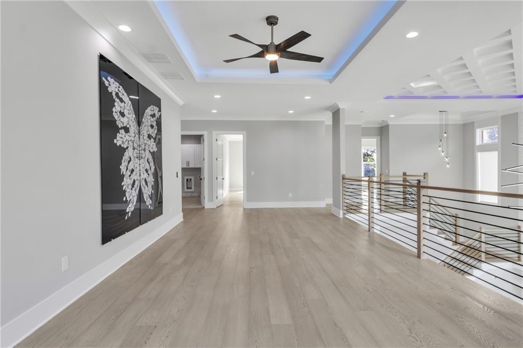 3671 Hamilton Mill Road Buford, GA 30519 - Photo 48 of 111 a view of a livingroom with a ceiling fan window and a ceiling fan