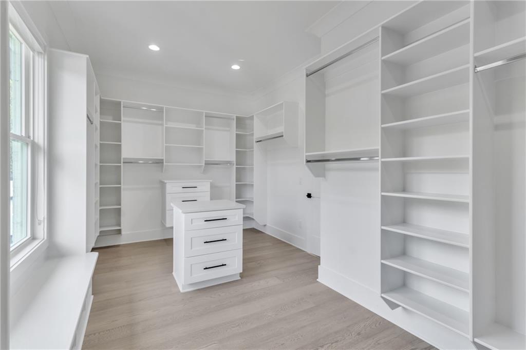 3671 Hamilton Mill Road Buford, GA 30519 - Photo 66 of 111 a view of walk in closet with empty racks