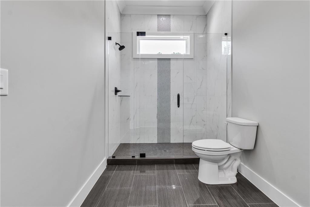 3671 Hamilton Mill Road Buford, GA 30519 - Photo 72 of 111 a bathroom with a sink and a toilet