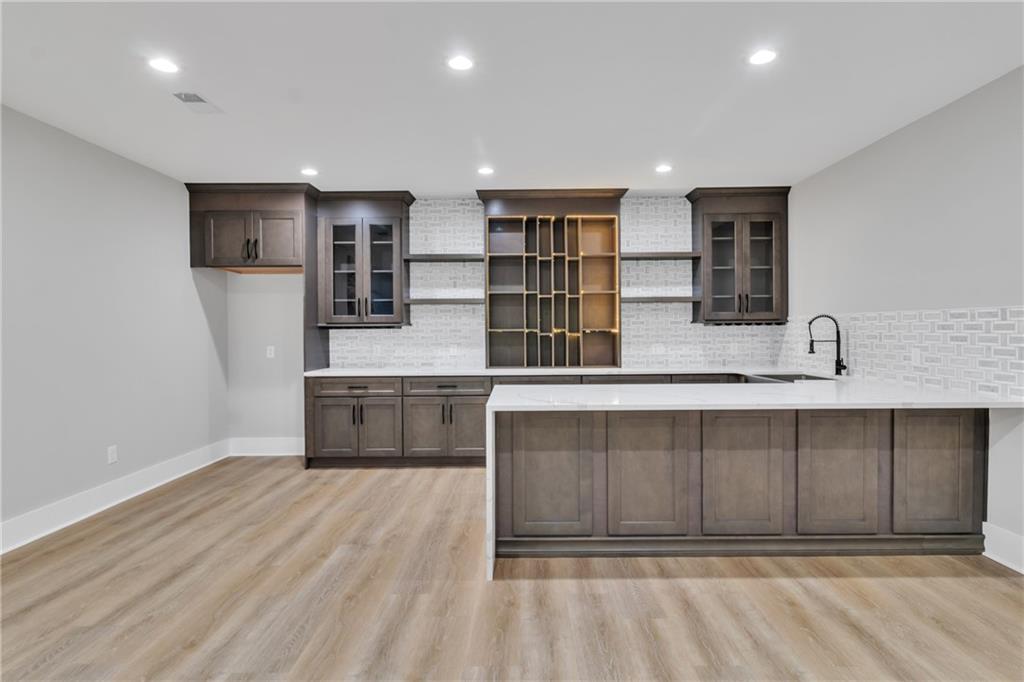 3671 Hamilton Mill Road Buford, GA 30519 - Photo 86 of 111 a kitchen with stainless steel appliances granite countertop a refrigerator and a sink