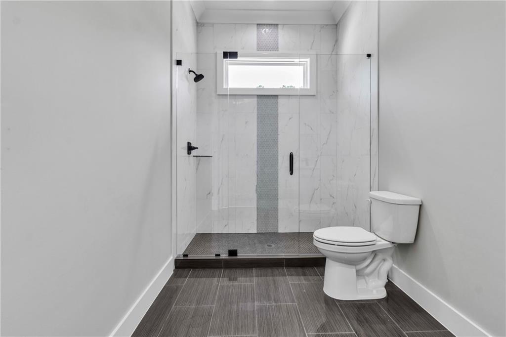 3671 Hamilton Mill Road Buford, GA 30519 - Photo 94 of 111 a bathroom with a sink and a toilet