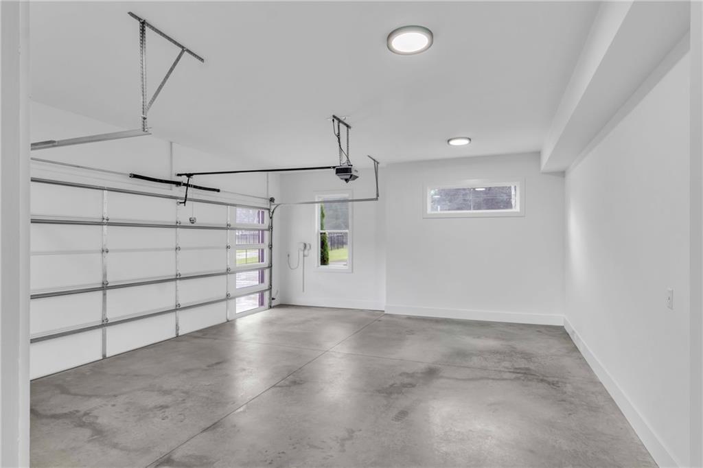 3671 Hamilton Mill Road Buford, GA 30519 - Photo 95 of 111 a view of a room with racks on the wall