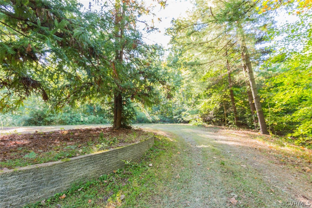 3100 Old Gun Road West Midlothian, VA 23113 - Photo 3 of 15 a view of a yard with a tree