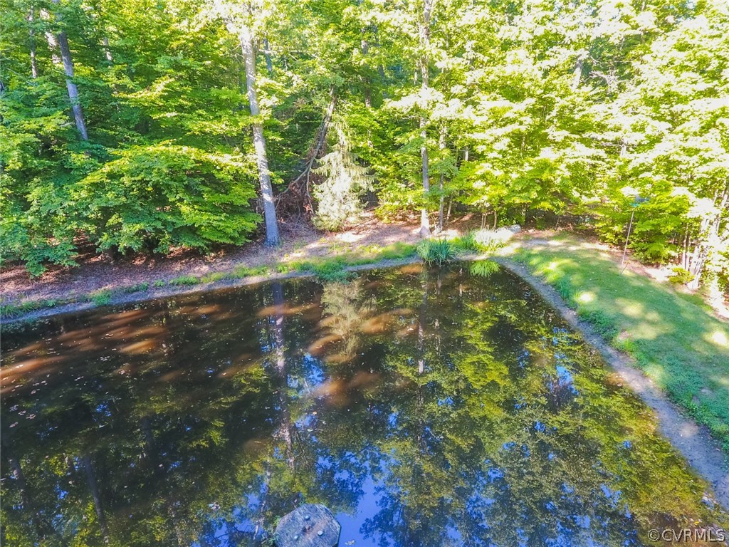 3100 Old Gun Road West Midlothian, VA 23113 - Photo 7 of 15 a backyard of a house with lots of green space