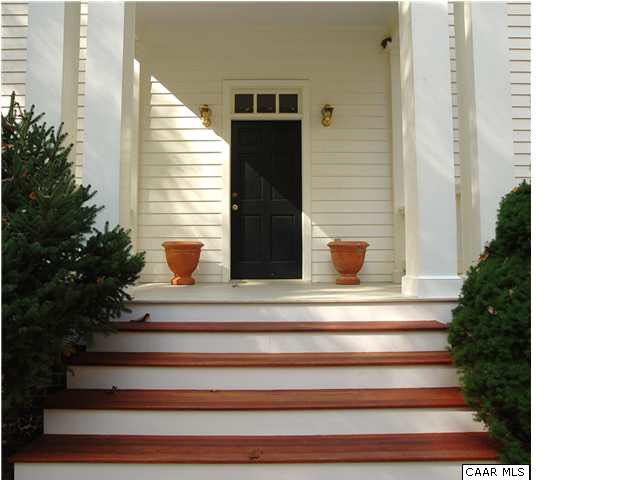 656 Broad Axe Road Charlottesville, VA 22903 - Photo 3 of 9 The front steps and columns immediately remind guests that the home is built with quality finishes and attention to all details.