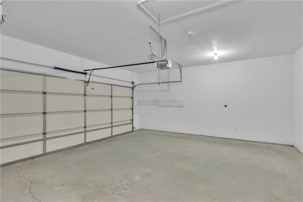 4557 Caleb Crossing, Unit 71 Powder Springs, GA 30127 - Photo 20 of 23 a view of a garage