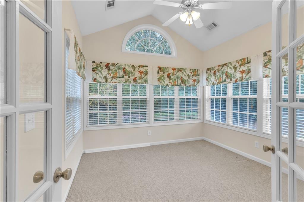 4557 Caleb Crossing, Unit 71 Powder Springs, GA 30127 - Photo 7 of 23 a view of an empty room with a window