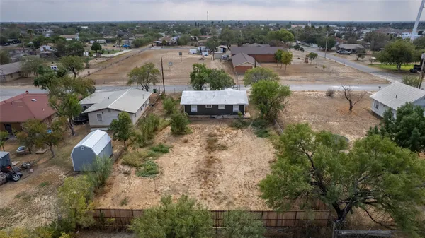 an aerial view of a house with a garden