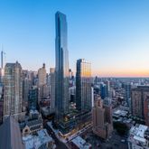 a view of a city with tall buildings